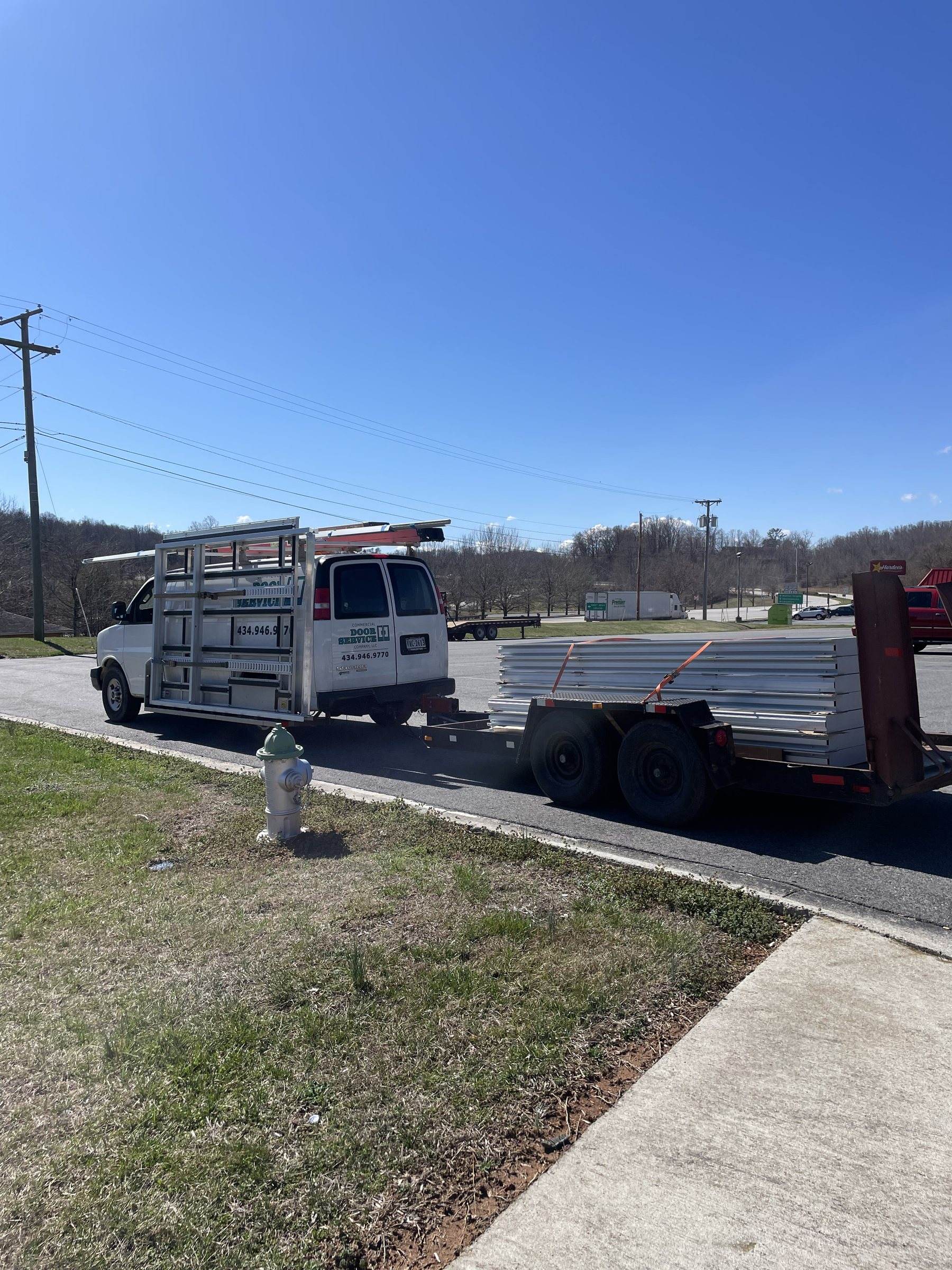 CDSC work van and trailer with glass racks